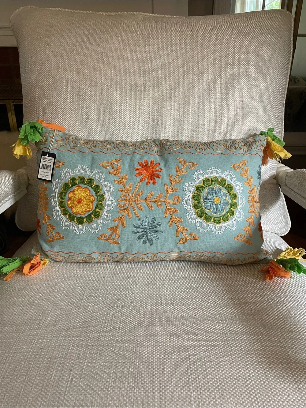 Pair of Creative Co-Op Aqua Embroidered Floral Tassel Lumbar Pillow. 20 inches l
